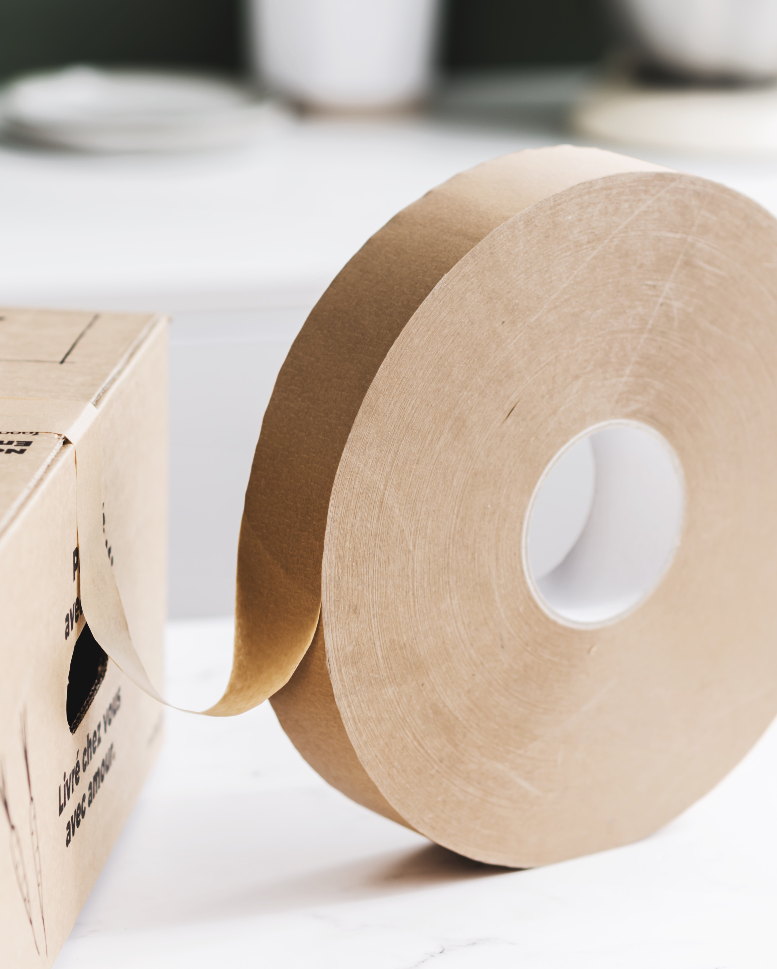 Overstap van plastic naar tape uit kraftpapier om Foodbag te sluiten. 